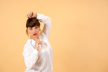Fototapeta na wymiar portrait of smiling brunette in white sweater