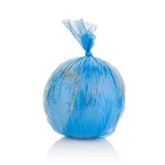 Globe of planet Earth dressed in a garbage plastic bag isolated on white.