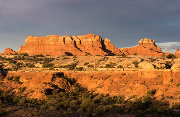 Sunrise in red rock country of the Needles District of Canyonlands National Park located in south central Utah.