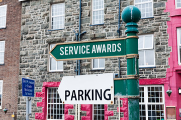 Fototapeta premium Conceptual hand writing showing Service Awards. Concept meaning Recognizing an employee for his or her longevity or tenure Advertisement concept with empty copy space on the road sign