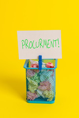 Obraz premium Text sign showing Procurment. Business photo showcasing action of acquiring military equipment and supplies Trash bin crumpled paper clothespin empty reminder office supplies yellow