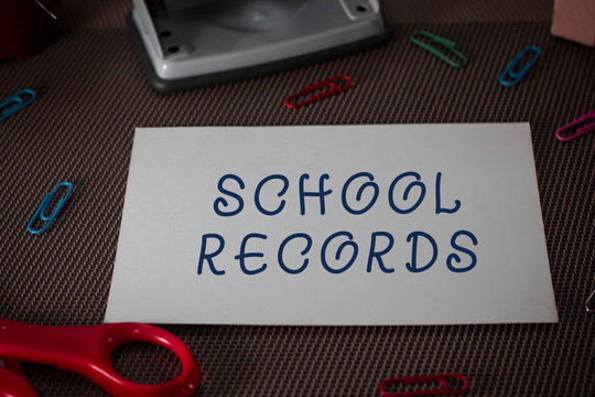 Word writing text School Records. Business photo showcasing Information that is kept about a child at school Biography Scissors and writing equipments plus plain sheet above textured backdrop