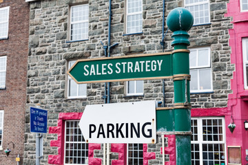 Conceptual hand writing showing Sales Strategy. Concept meaning Plan for reaching and selling to your target market Marketing Advertisement concept with empty copy space on the road sign