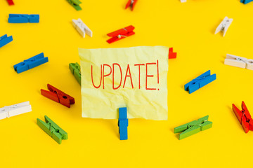 Conceptual hand writing showing UPDATE. Concept meaning make something more modern or up to date like software program