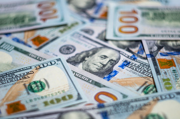 Background of one hundred dollar bills.Texture of one hundred American dollars.