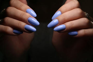 glamorous beautiful manicure on a trendy texture background