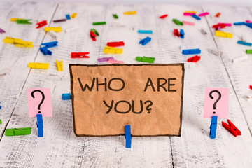 Conceptual hand writing showing Who Are You question. Concept meaning asking demonstrating identity...