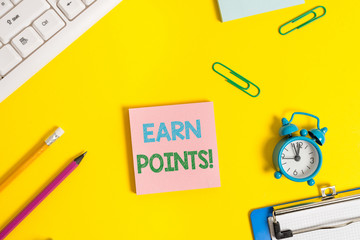 Text sign showing Earn Points. Business photo showcasing collecting scores in order qualify to win big prize Flat lay above copy space on the white crumpled paper