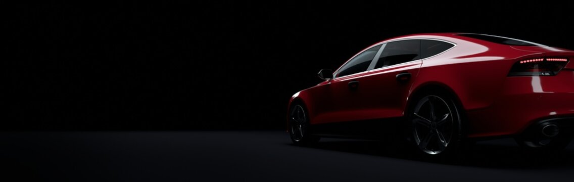 Red sports car on elegant dark background.