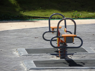 Public children playground with its component. Design with considering safety feature for kids. 