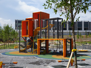 Public children playground with its component. Design with considering safety feature for kids. 