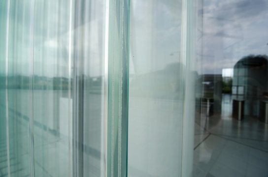glass section, on the facade of a building. triple composite glass on crystal building, skyscraper lobby entrance.
