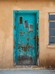 Naklejka premium Old peeling aqua door