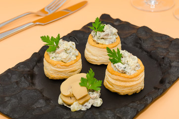 Vol au vent stuffed with mushroom salad