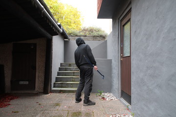 Burglar in black clothes