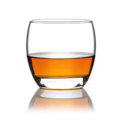 Scotch in a round tumbler isolated on white
