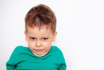 emotional boy on a light background