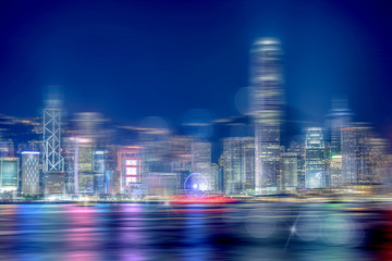 Abstract bokeh light with Hong Kong City night view background; Double Exposure