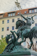  Focus in the 'Saint George and the Dragon' statue, made by the German sculptor August Kiss, and located in a square near the Spree river canal, in Nikolaiviertel