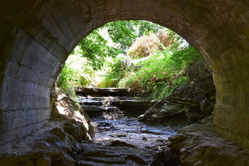stone arch over creek