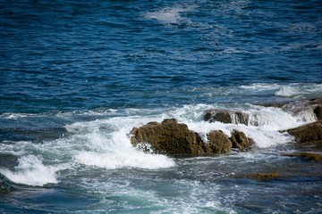 Waves on rocks