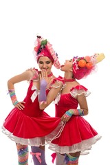 Showgirls dancing in original dresses view