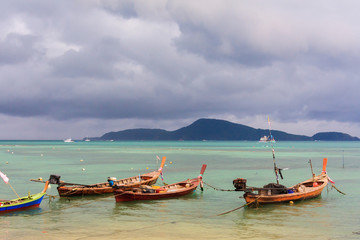 Fototapeta na wymiar Fishing boats moored in a bay