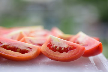 Fresh red tomatoes cut Prepare to cook