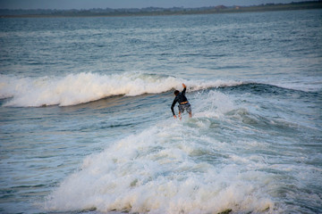 man surfing in sea