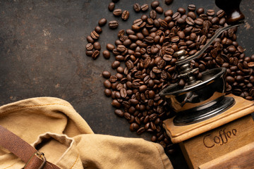 Coffee, coffee beans on the table, dark background, top view , Free space for text input