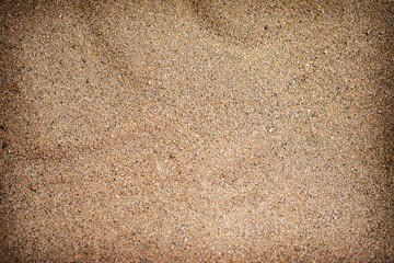 Sand texture or background, Brown color.