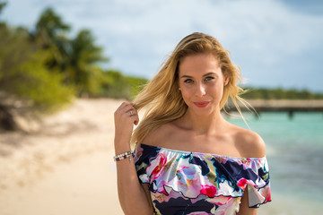 Blonde girl on the beach of the Mexican Caribbean