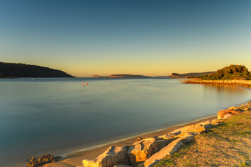 Fototapeta premium Clear Skies Sunrise over the Bay