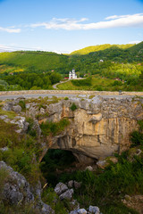 landscape with God's Bridge a natural bridge in Romania