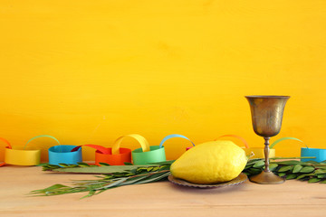 Jewish festival of Sukkot. Traditional symbols (The four species): Etrog, lulav, hadas, arava