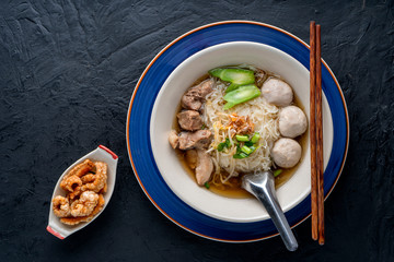 Thai style noodles on dark table background , Thai food concept