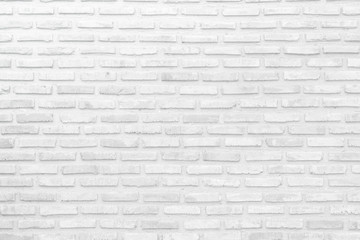 Wall white brick wall texture background in room at subway. Interior rock old clean uneven tile...