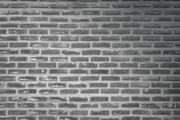 Abstract Wall black brick wall texture background pattern, brick surface backgrounds. Vintage Brickwork or stonework flooring interior rock old clean concrete grid uneven, wall bricks design.