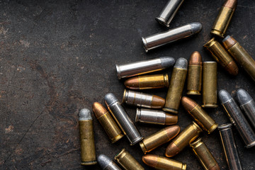 Hand guns , ammo ,Guns with ammunition on Dark background.  - obrazy, fototapety, plakaty