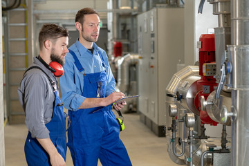 two worker in industrial plant