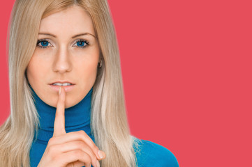 Secret woman. woman shows hush be quiet. isolated on background indian shade red.