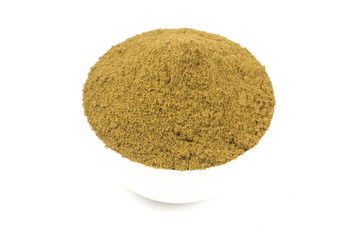 coriander powder with coriander seeds isolated on white background
