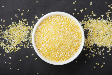 A bowl with crushed maiz	