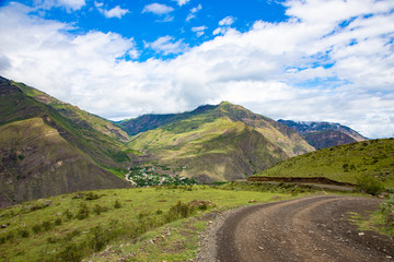 Mountain landscape on a Sunny summer day blue cloudy sky.