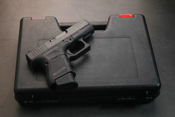 short gun on gray background