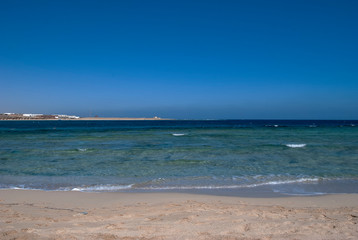 The sandy beach of Marsa Abu Dabab bay in Egypt