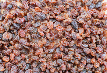 Diet healthy food. Raisin dried grape as background texture.
