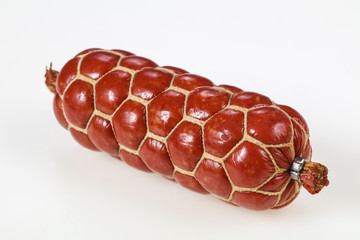 Tasty meat sausages over white background