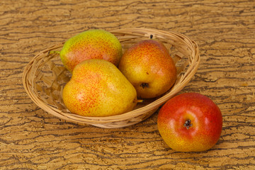 Pear heap in the wooden basket