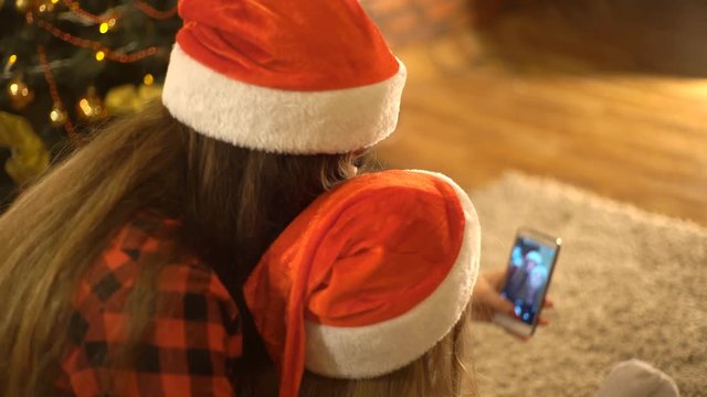 New Year's Selfie Girl, Photographed Themselves On The Background Christmas Tree